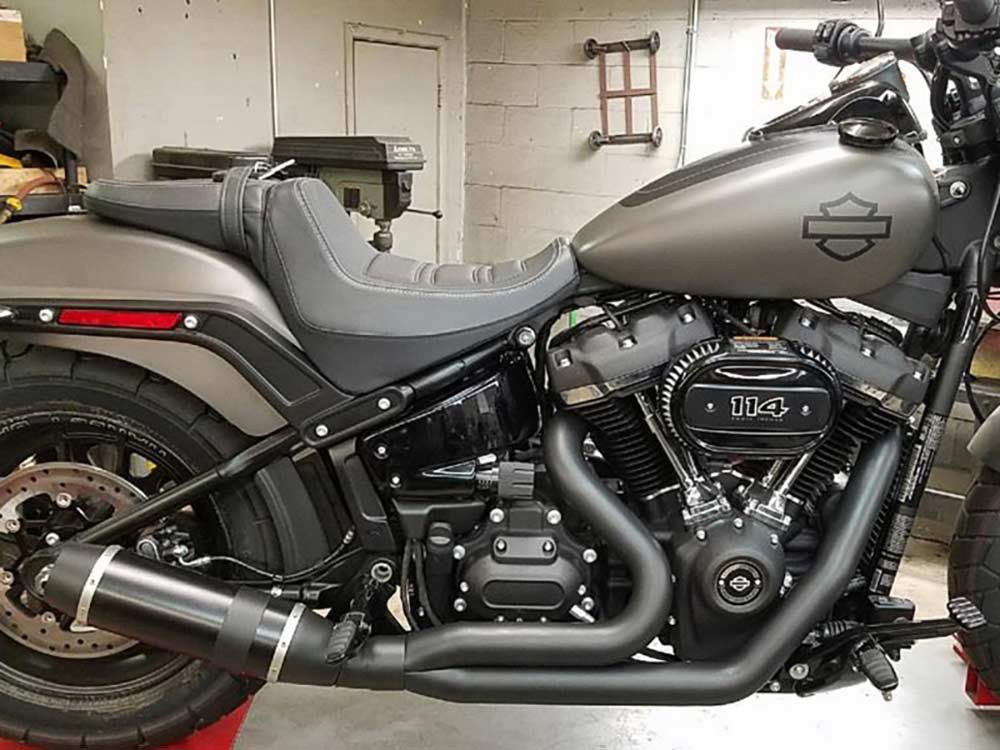 Bob Cat 2-into-1 Exhaust - Black with Black Satin Sleeve Muffler. Fits Softail 2018up Non-240 Tyre Models.