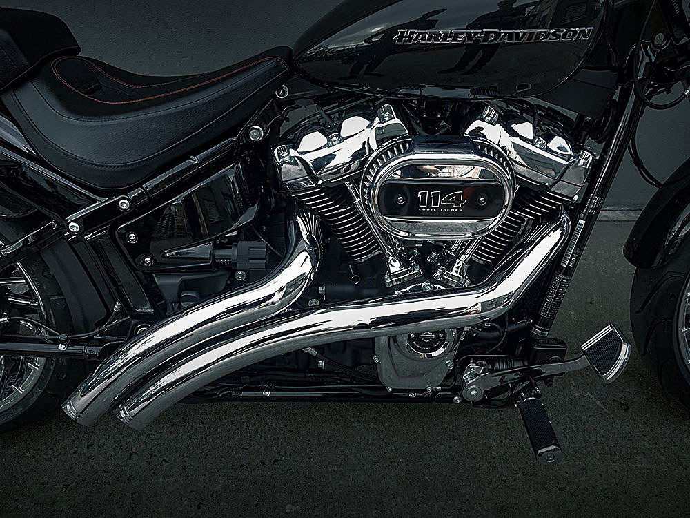Radical Radius Exhaust - Chrome with Chrome End Caps. Fits Softail 2018up.