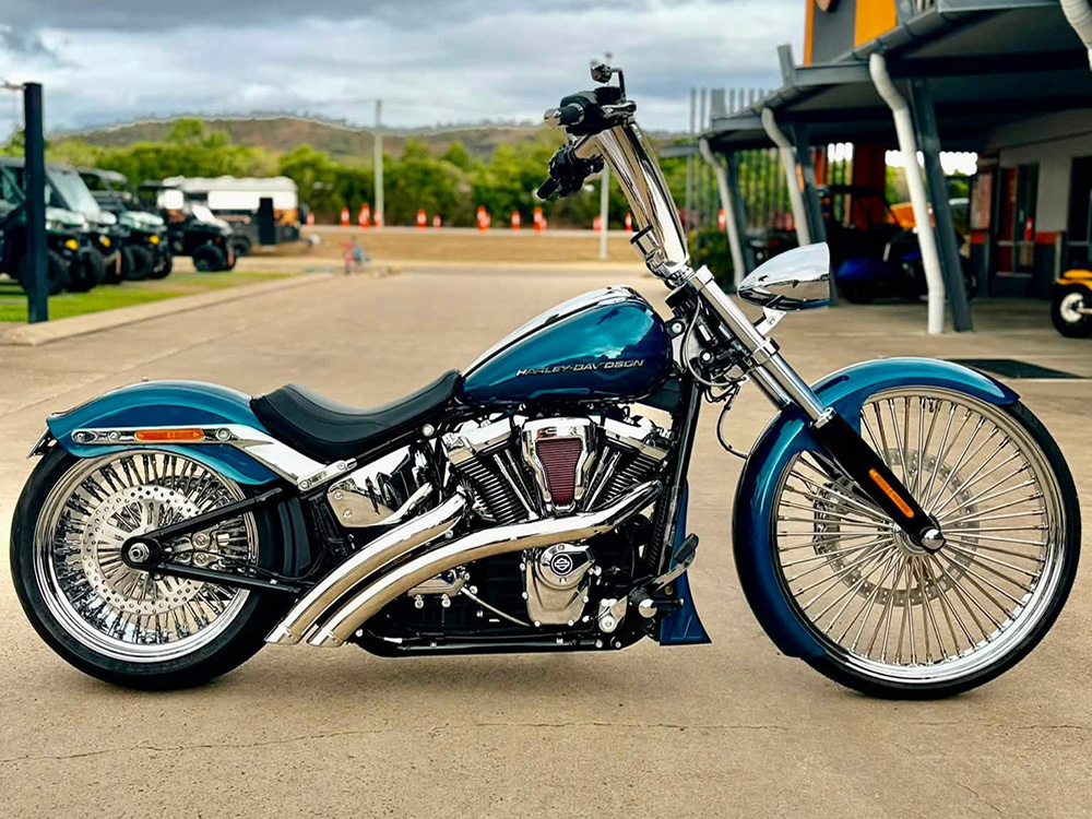 Radical Radius Exhaust - Chrome with Chrome End Caps. Fits Softail Breakout & Fat Boy 2018up - Freedom Performance Exhaust