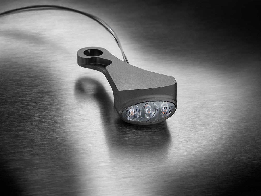 Dash M Under Perch Turn Signal Left - Black. Fits Softail 2015-2024 & Touring 2009-2023 Models with Cable Clutch